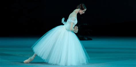 How Long is the Ballet Giselle, and Why Do Dancers Wear Feathers in Their Hair?